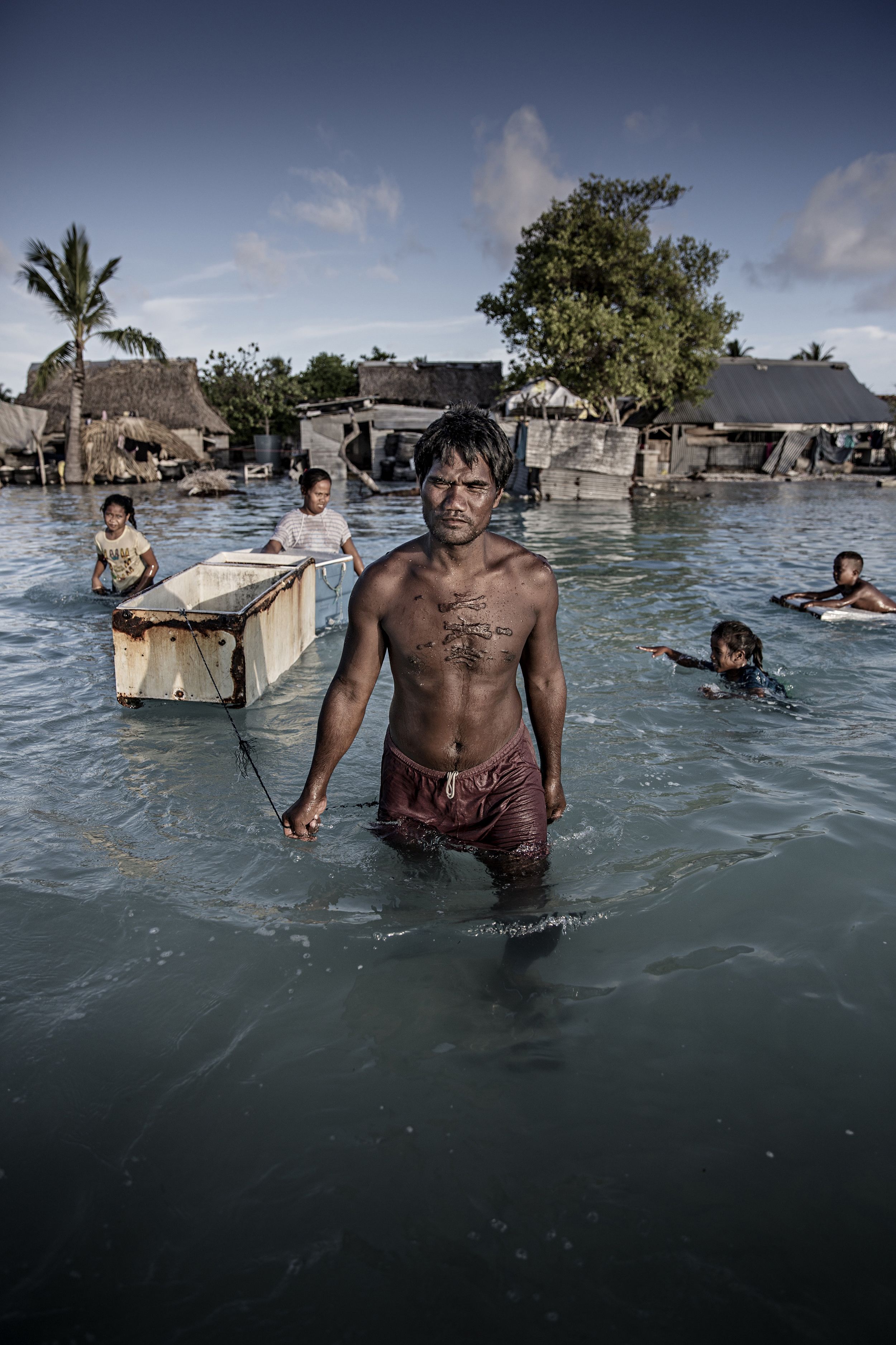 Three islands disappeared in the past year. Is climate change to blame? 190607-kiribati-al-1213-2500x3750